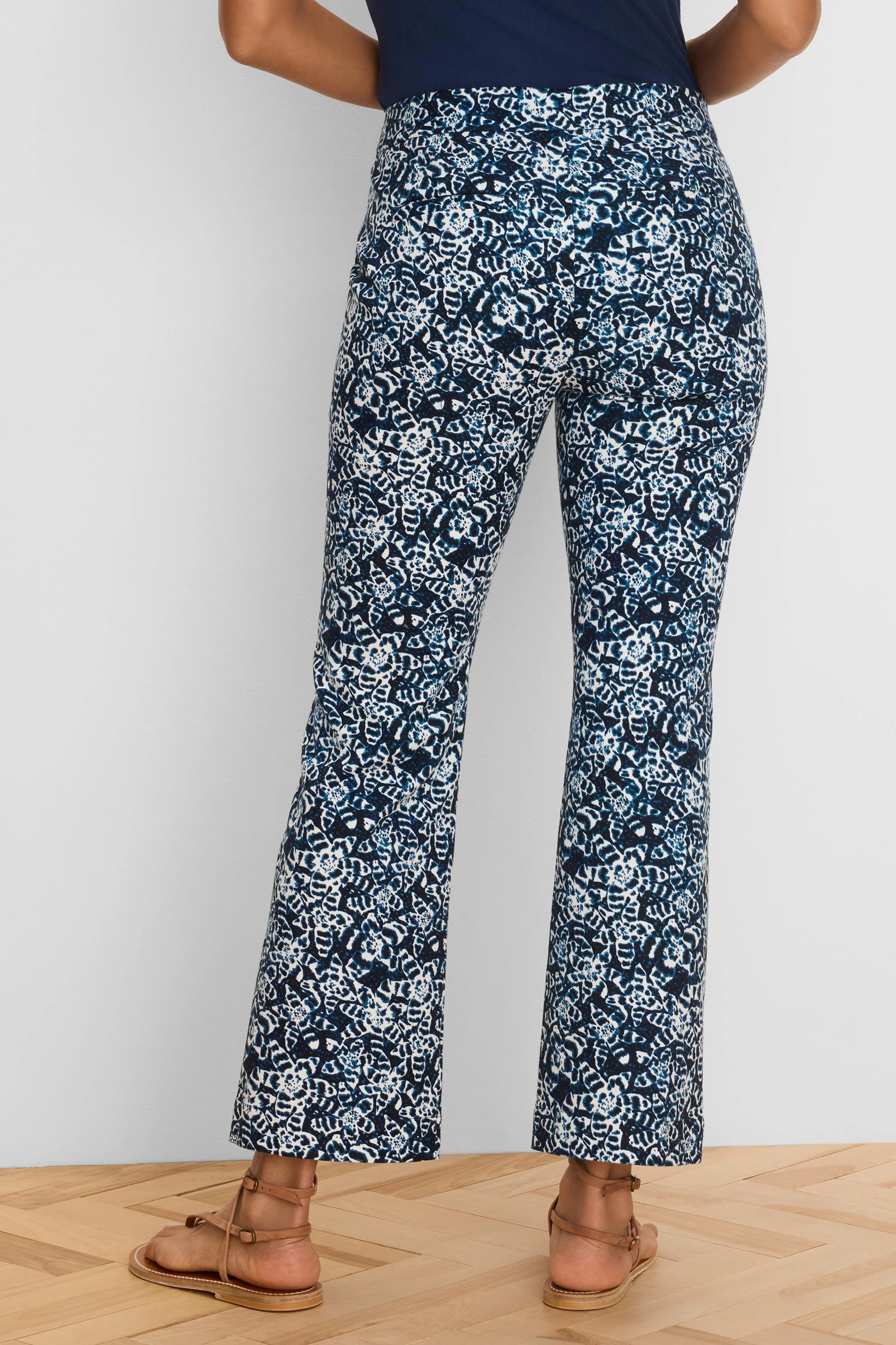 Navy and white shibori-patterned demi-boot ankle pants.