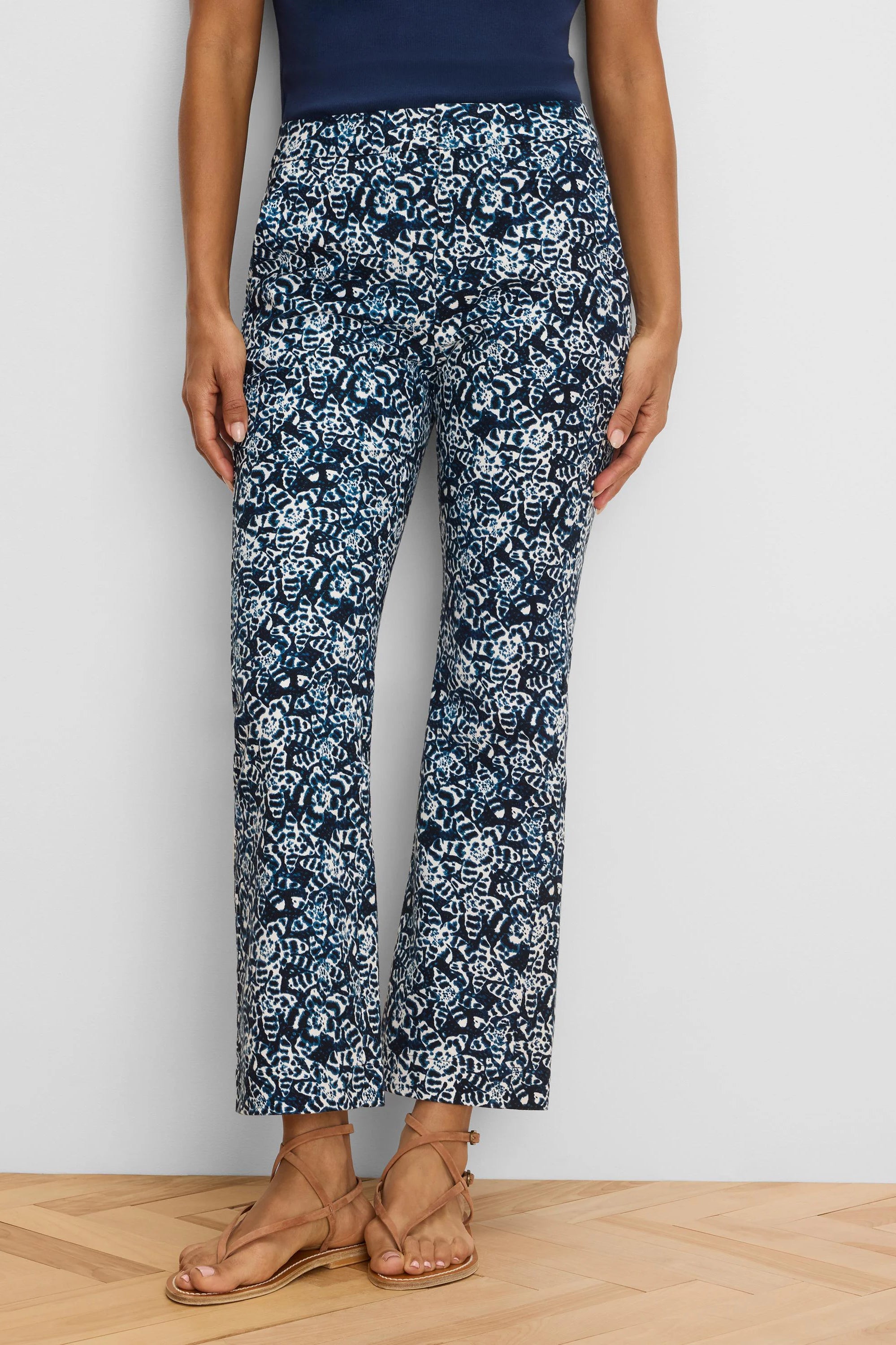 Dark blue and white shibori lily ankle pants with a demi-boot cut.