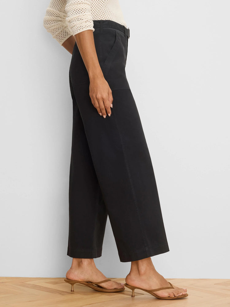 Black wide-leg ankle pants with a belted waist, soft drape, and side pockets.