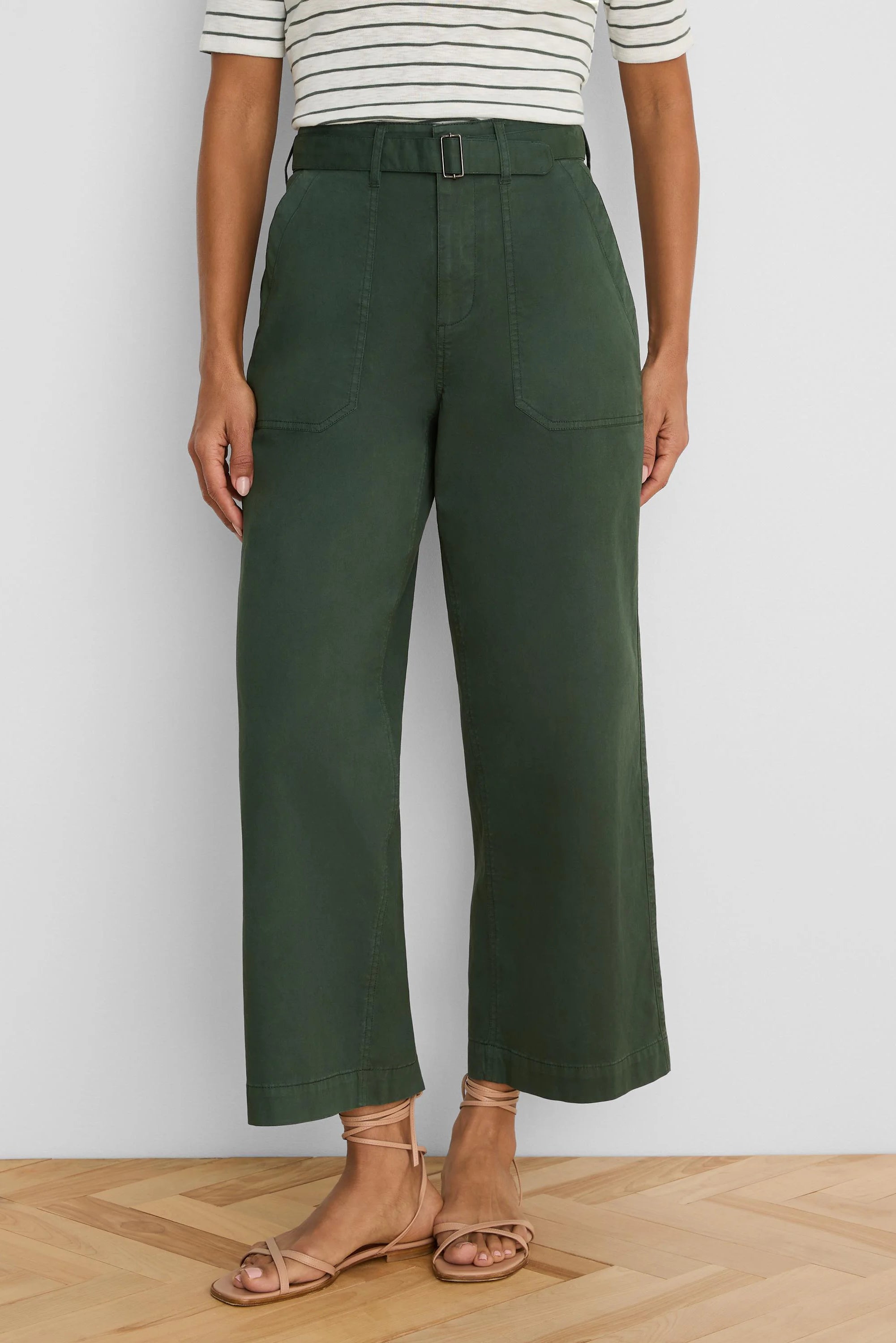 Dark green wide leg ankle pants with an integrated fabric belt, silver buckle, and front patch pockets.