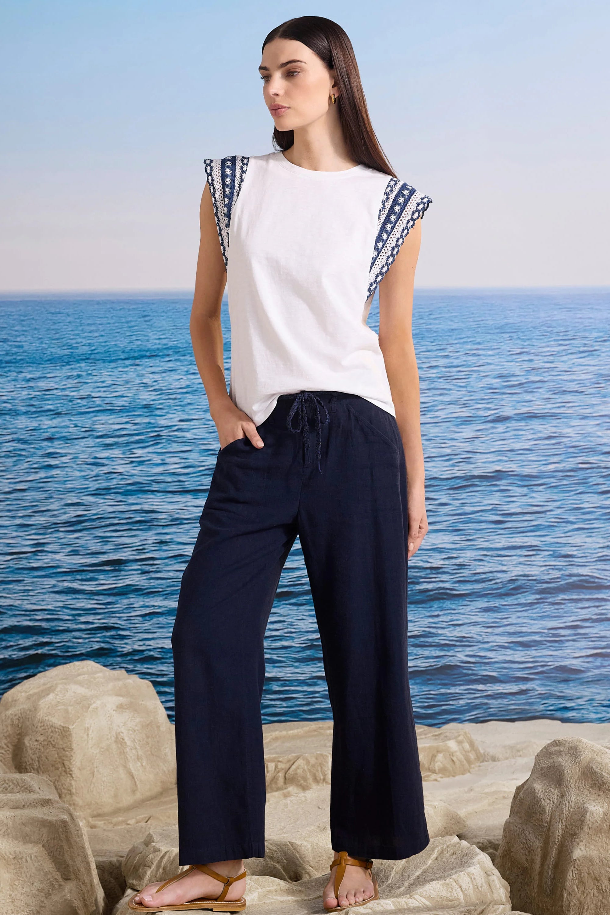 Navy wide leg ankle pants with a drawstring waist.