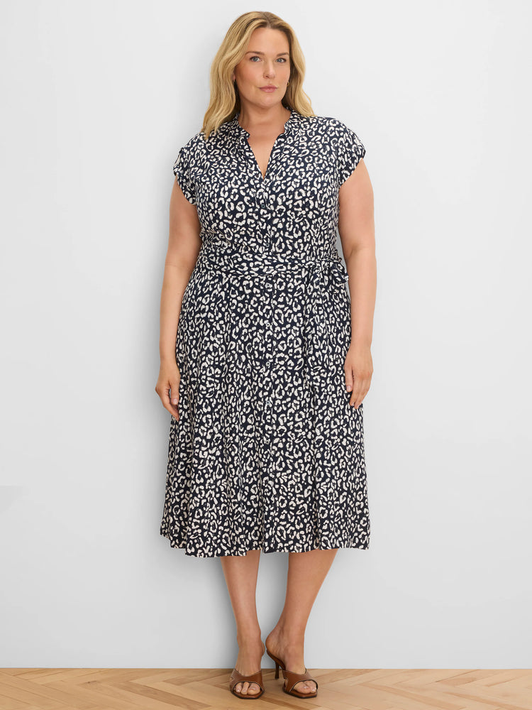 Navy and off-white leopard sketch midi dress with V-neck, short sleeves, button front, and tie waist.