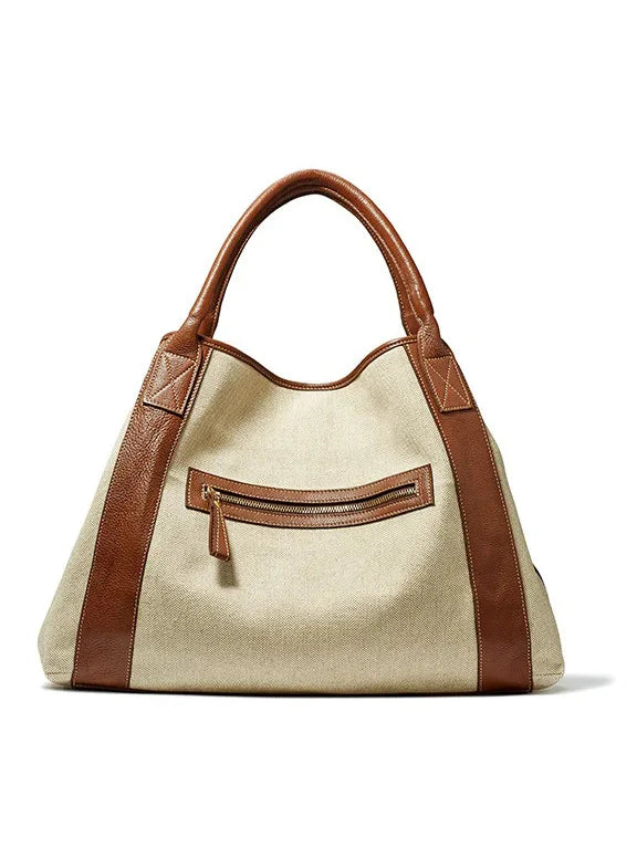 Linen leather tote bag: Beige linen body, brown leather handles & trim, and a front curved zipper pocket.