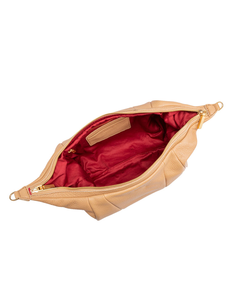 Beige leather shoulder bag with gold zipper & red interior lining. Top view shows interior details.