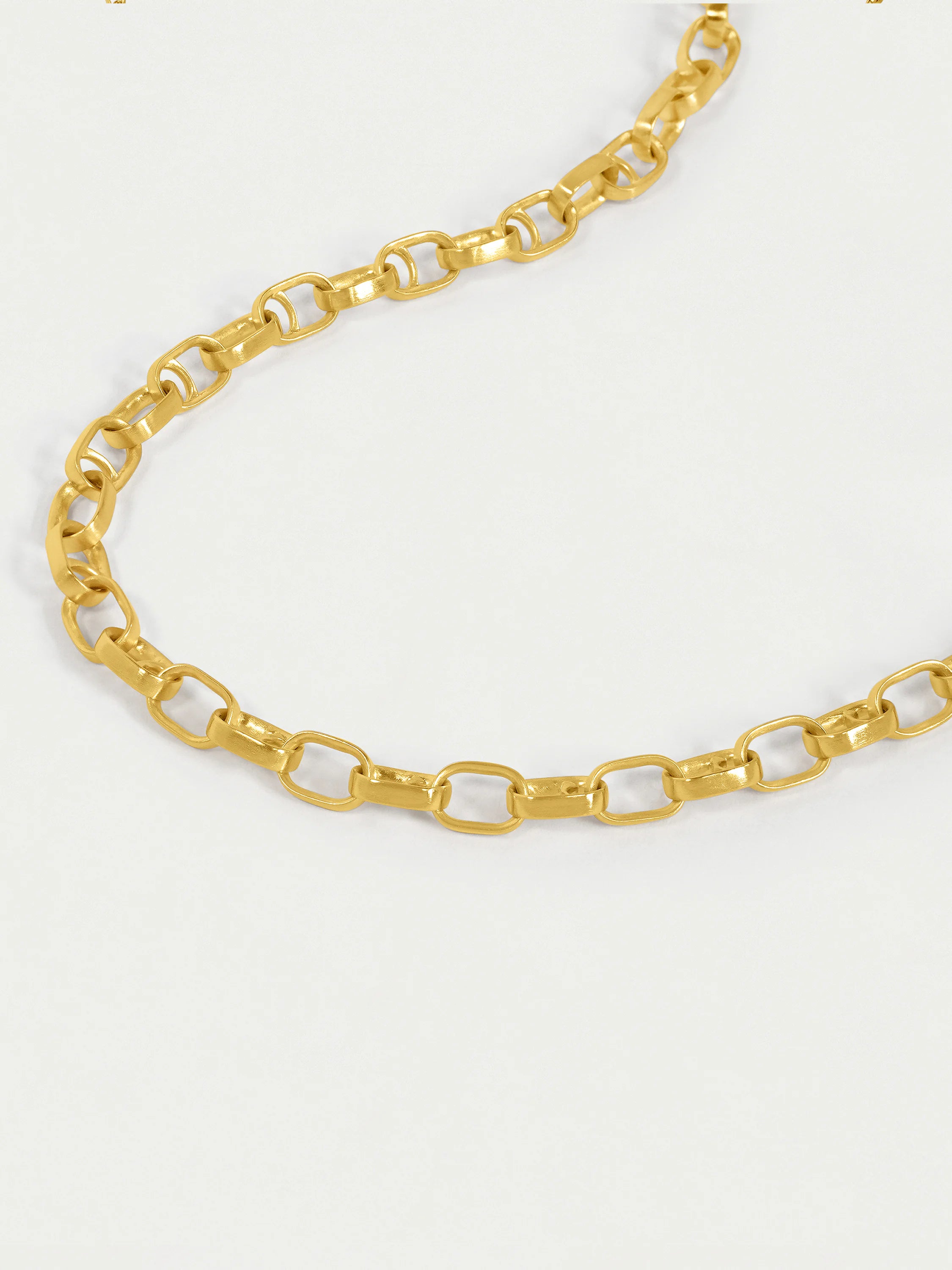 Gold, oval-link chain necklace.