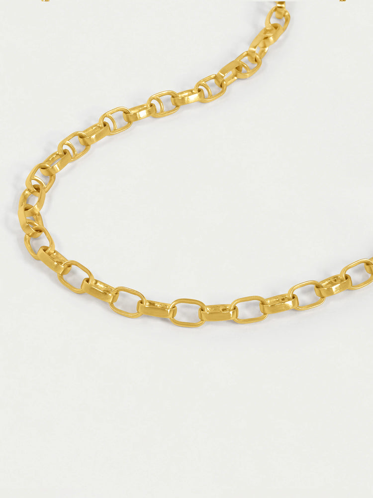 Gold, oval-link chain necklace.