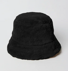 Black faux fur bucket hat.  The brim has a slightly lighter, tan undertone.
