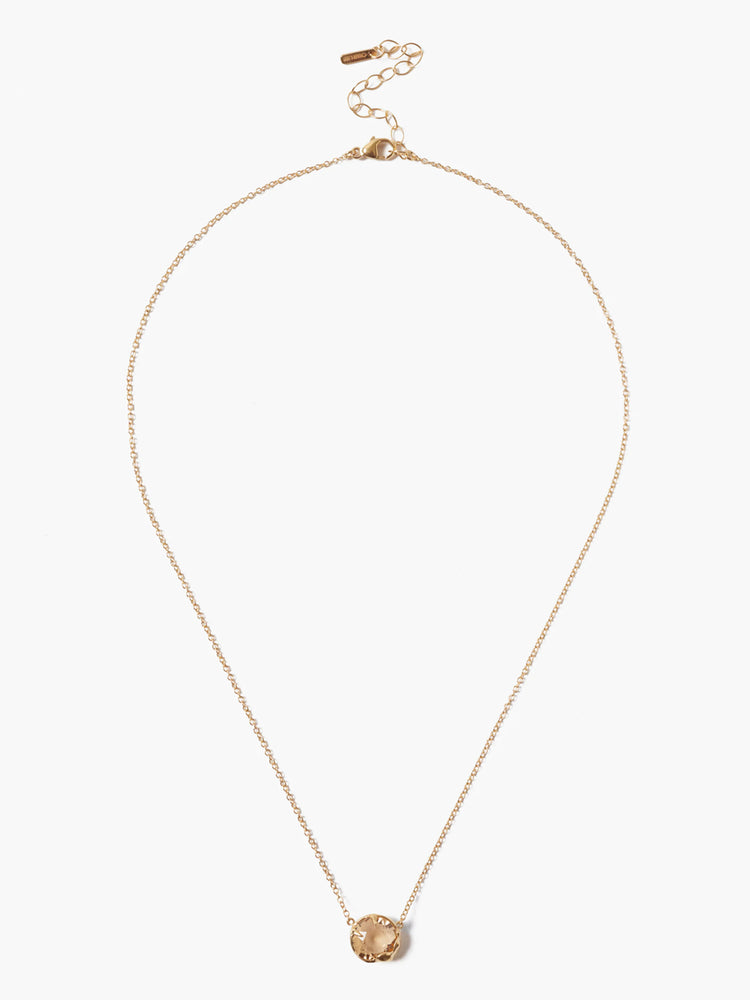 Gold-tone chain necklace with a round, faceted, translucent light brown stone pendant. Features a lobster clasp and extender.