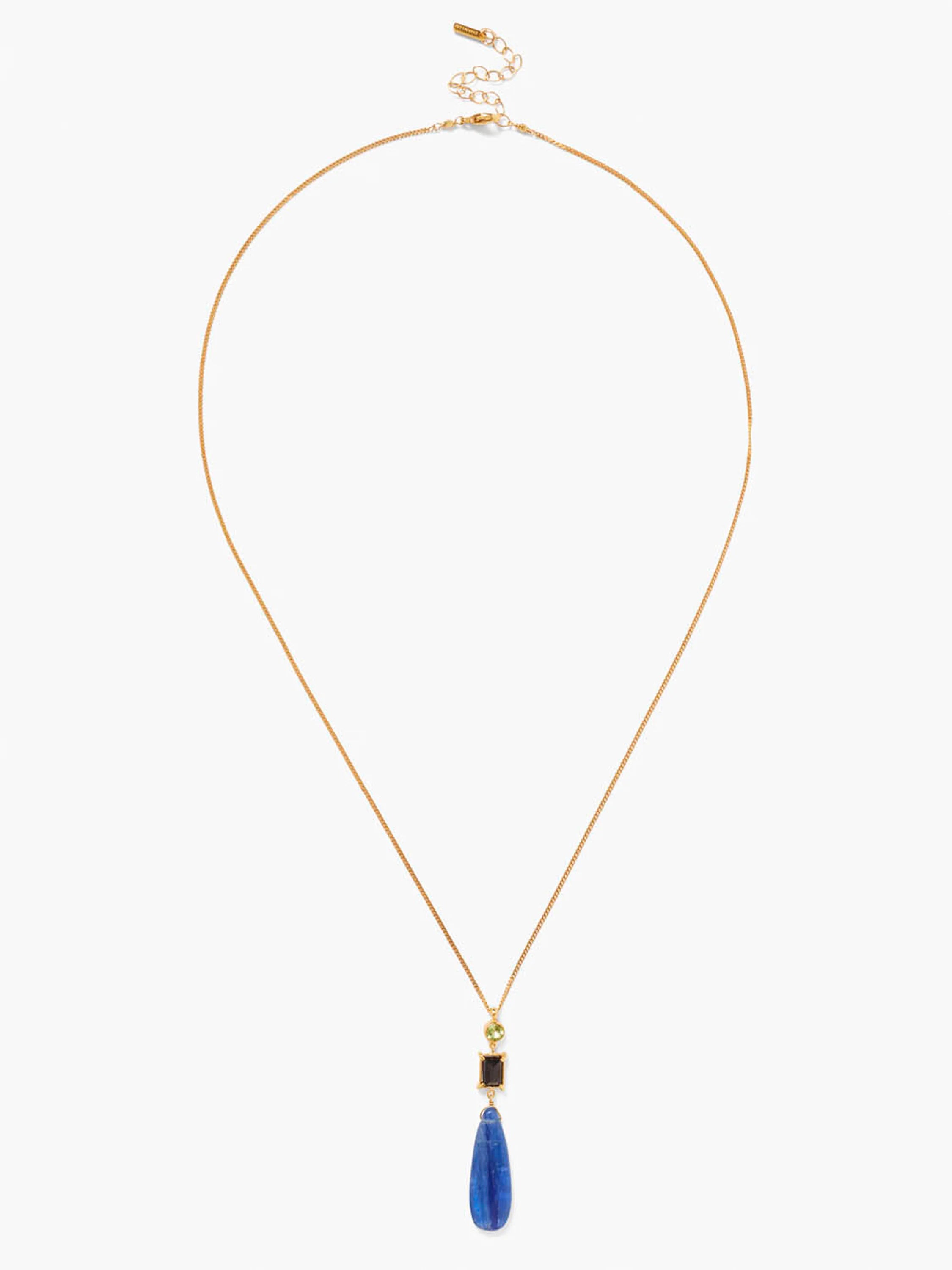 Gold chain necklace with a drop pendant featuring round green, rectangular black, and teardrop blue stones.