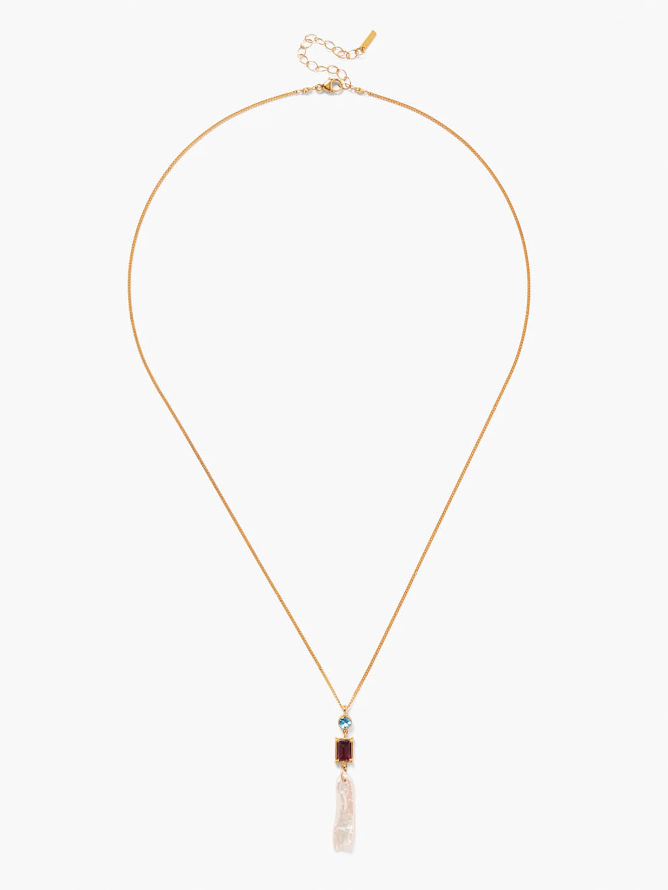 Gold chain necklace with light pink pearl, dark red, and light blue stone accents.