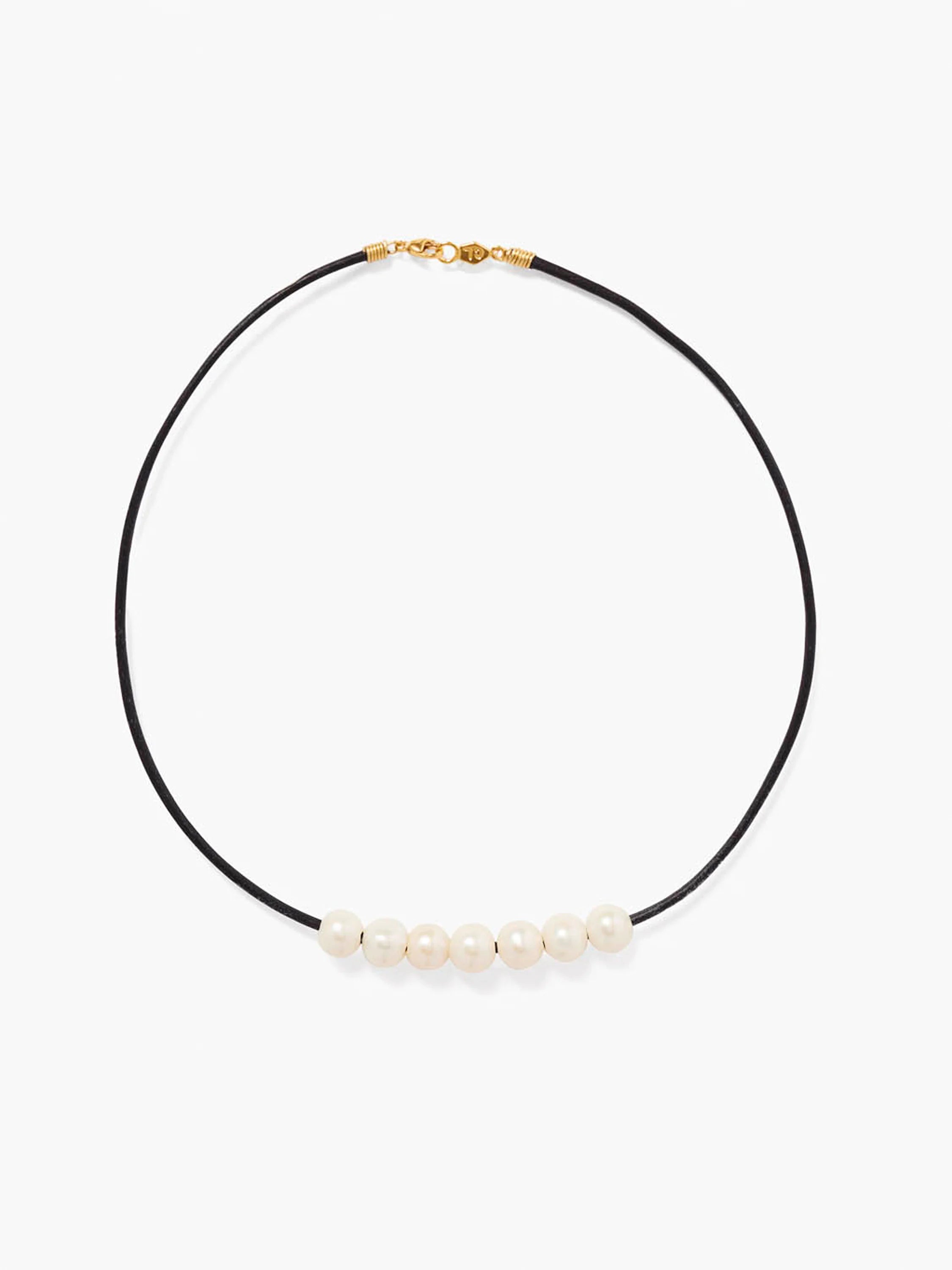 Black leather cord necklace with gold clasp, featuring six off-white pearls.