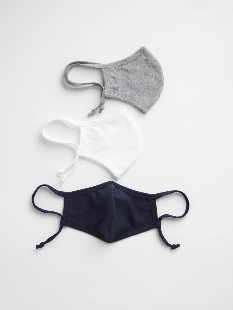 Three cloth face masks: gray, white, and navy blue. Each has ear loops and ties.
