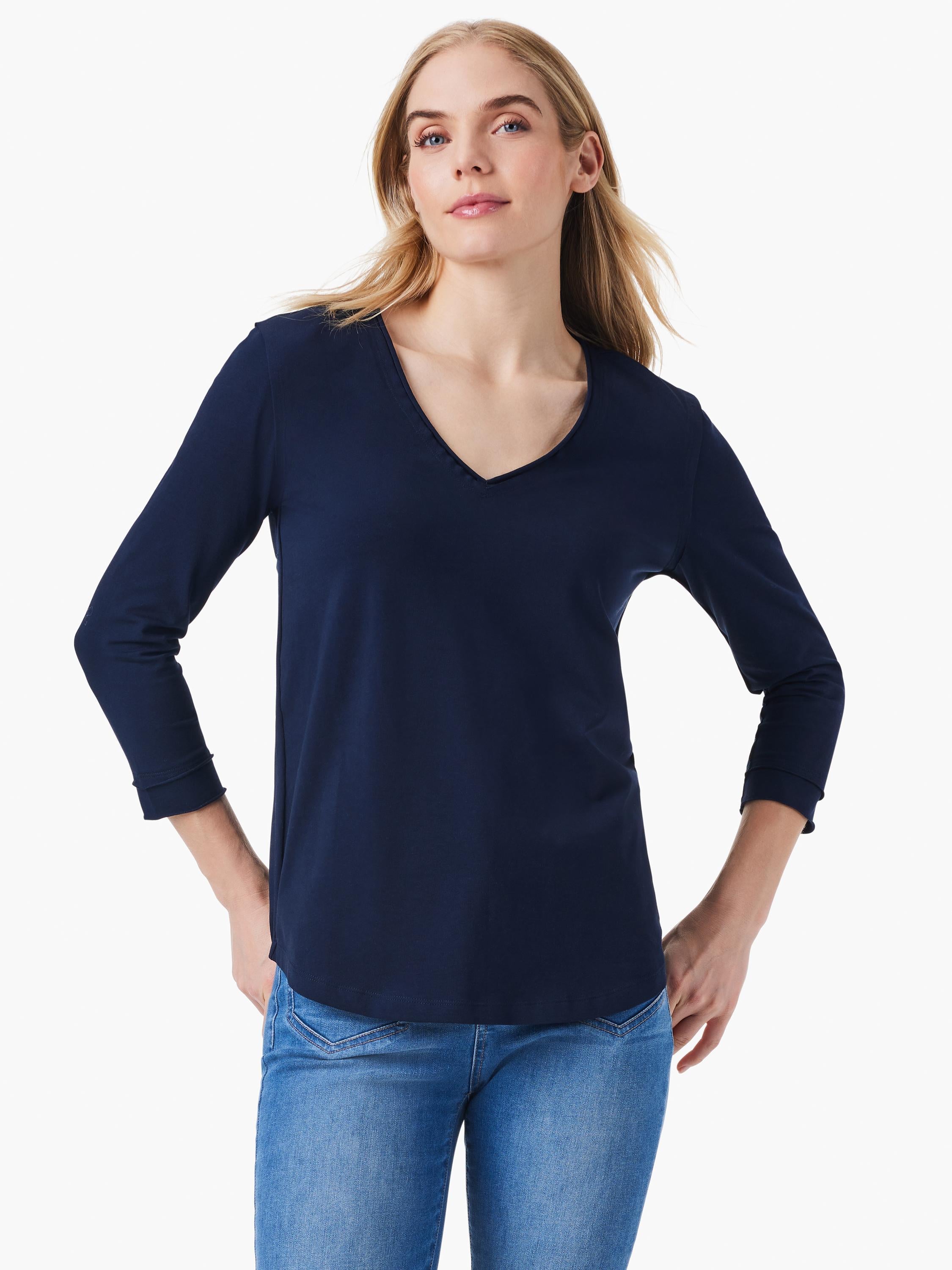 This relaxed navy blue V neck top features three quarter length cuffed sleeves and a curved hem.
