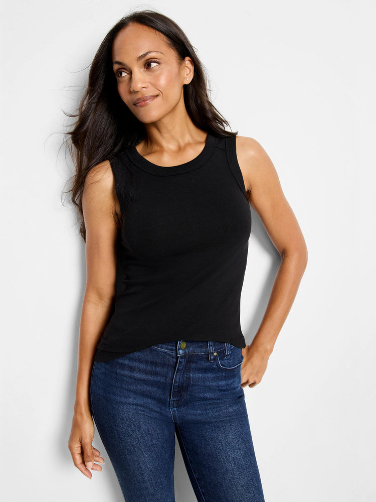 Black ribbed sleeveless top, round neck.