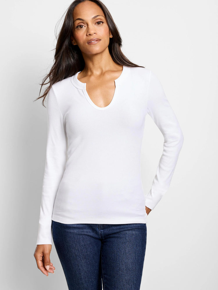 White ribbed long-sleeve shirt, split neckline.