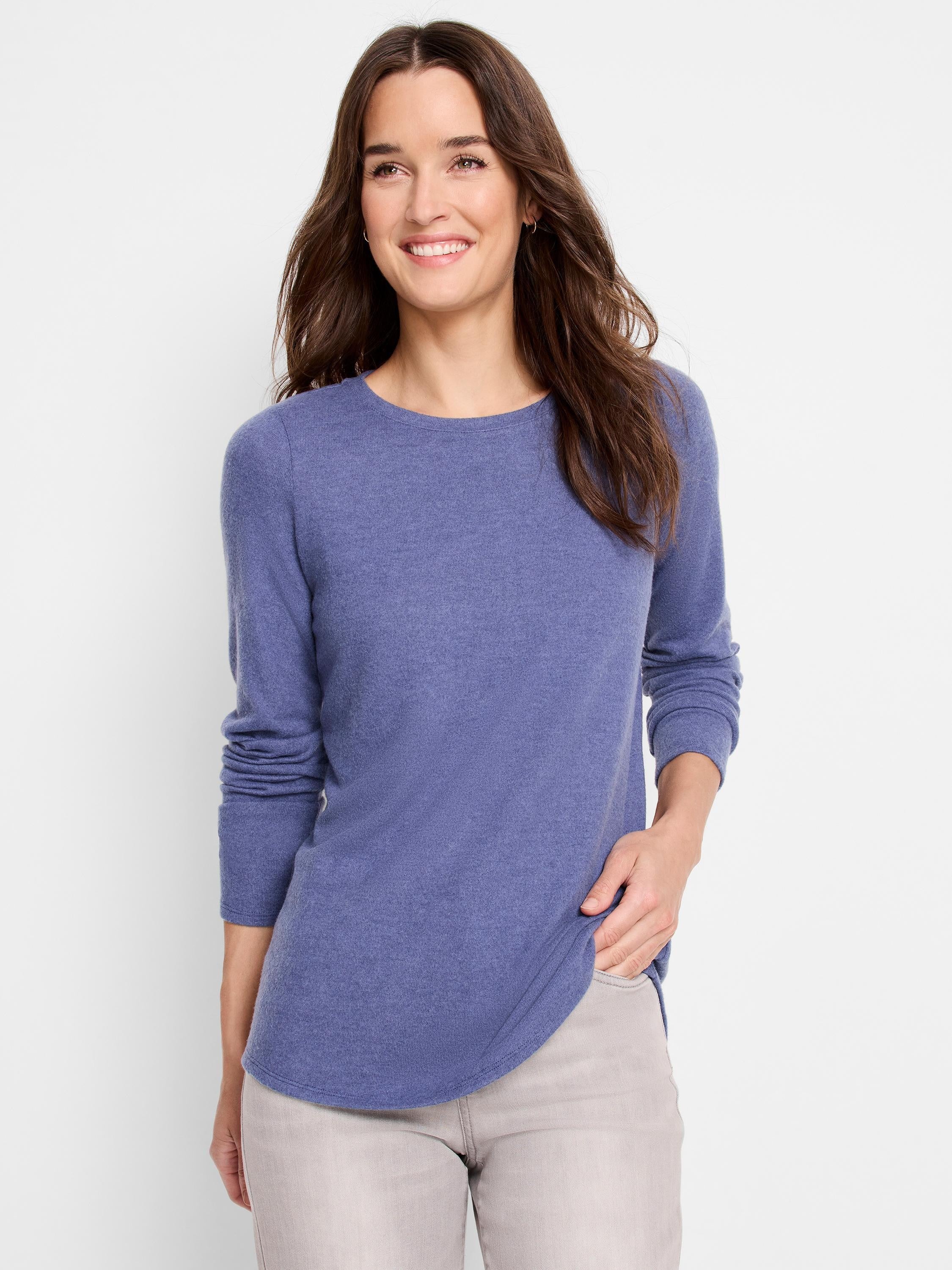 Periwinkle blue, long-sleeve shirttail tee. Round neckline, relaxed fit.