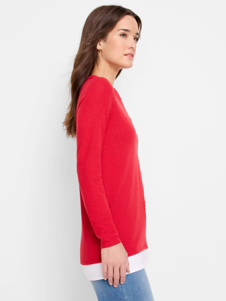 Red long-sleeved layered top. The top layer is red, the bottom layer is white.