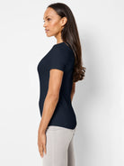 Navy blue short sleeve crew neck tee, fitted on a model.