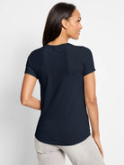 Dark navy short sleeve crew neck tee, featuring diagonal back seams and a curved hem.
