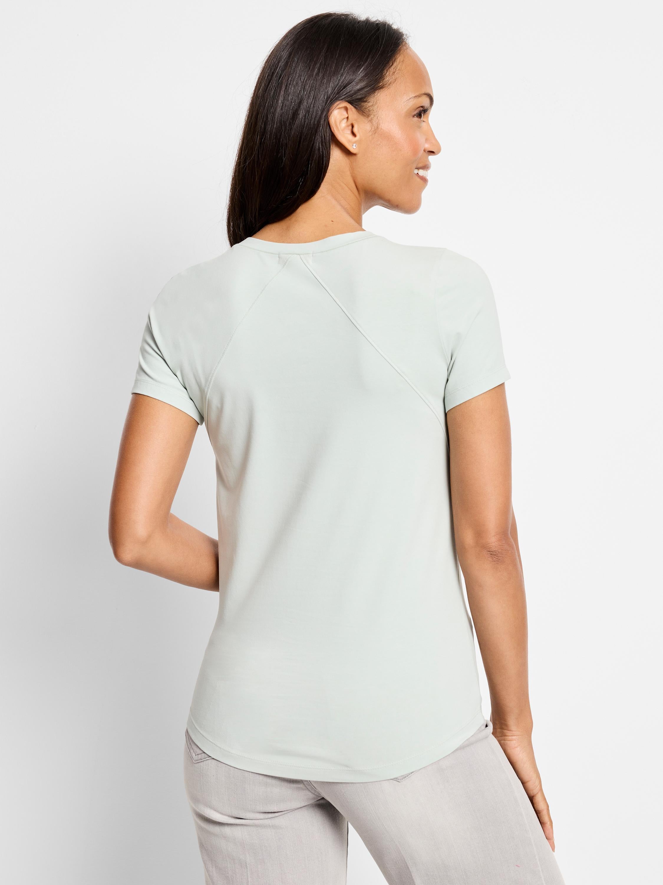 Light sage short-sleeve performance tee with a crewneck, raglan sleeves, and a casual fit.