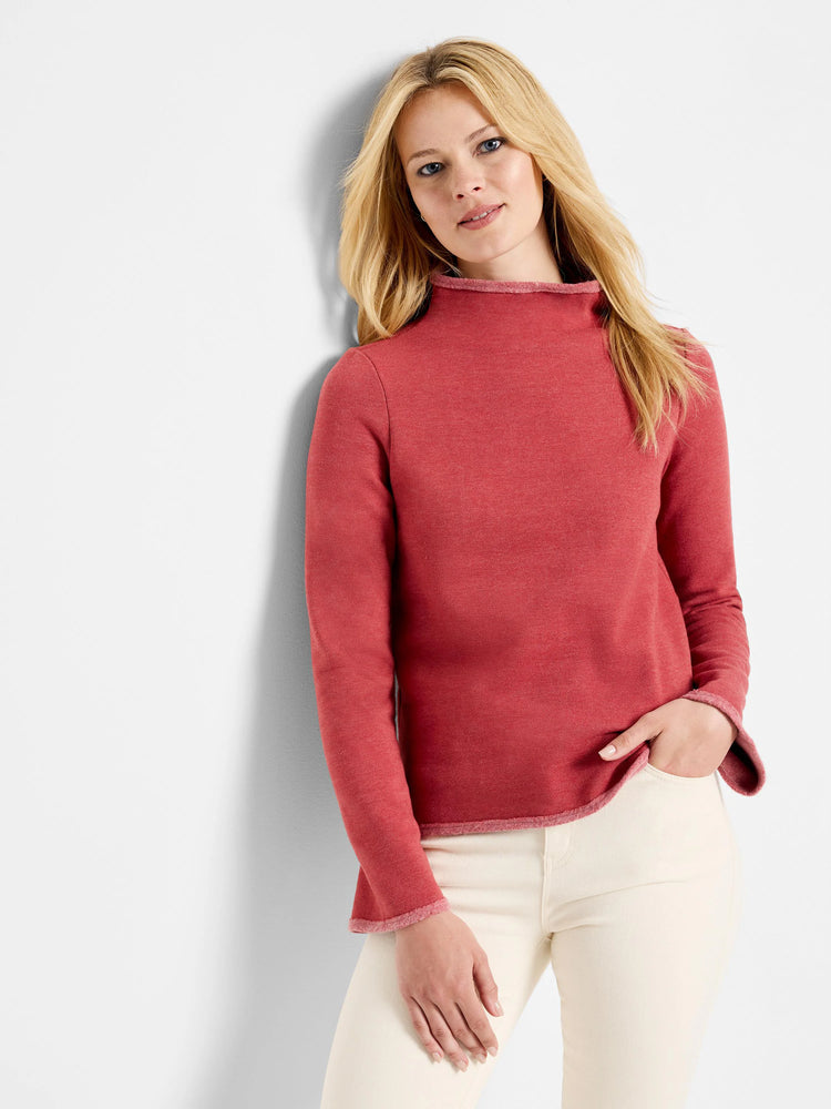 Red long-sleeve top with a mock neck and darker red trim. Slightly loose fit.