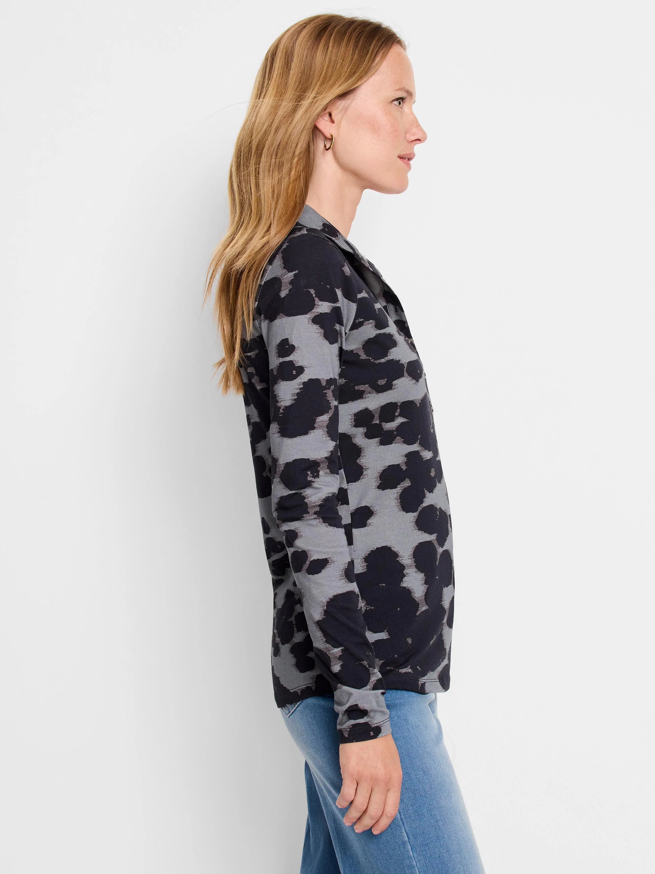 Long-sleeve polo shirt; gray and black abstract print. Long sleeves, collared.