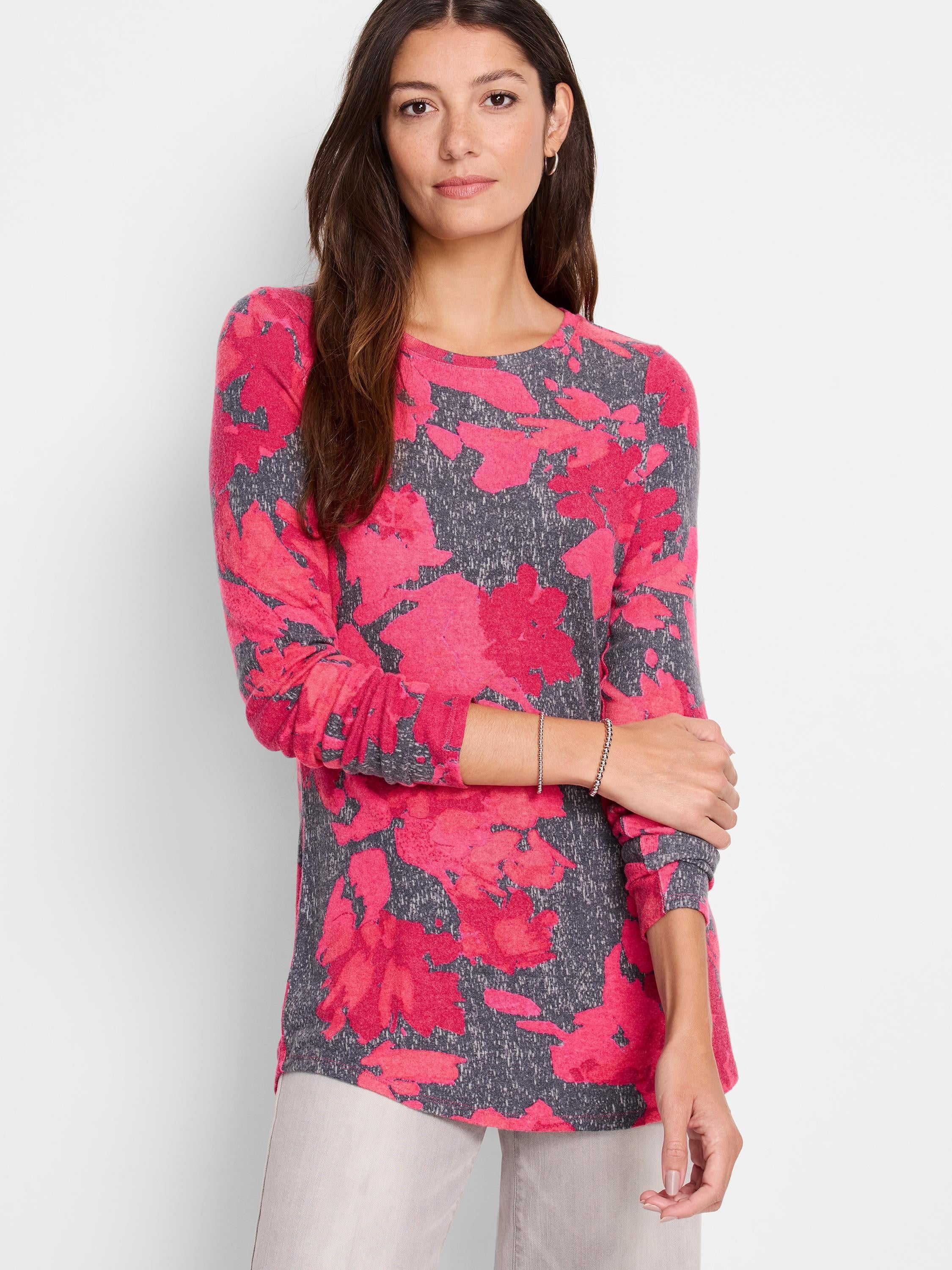 Long-sleeve shirttail tee with a pink and gray floral print.  The gray background is mottled.  The pink flowers are abstract.