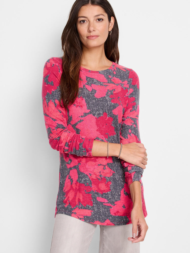 Long-sleeve shirttail tee with a pink and gray floral print. The gray background is mottled. The pink flowers are abstract.