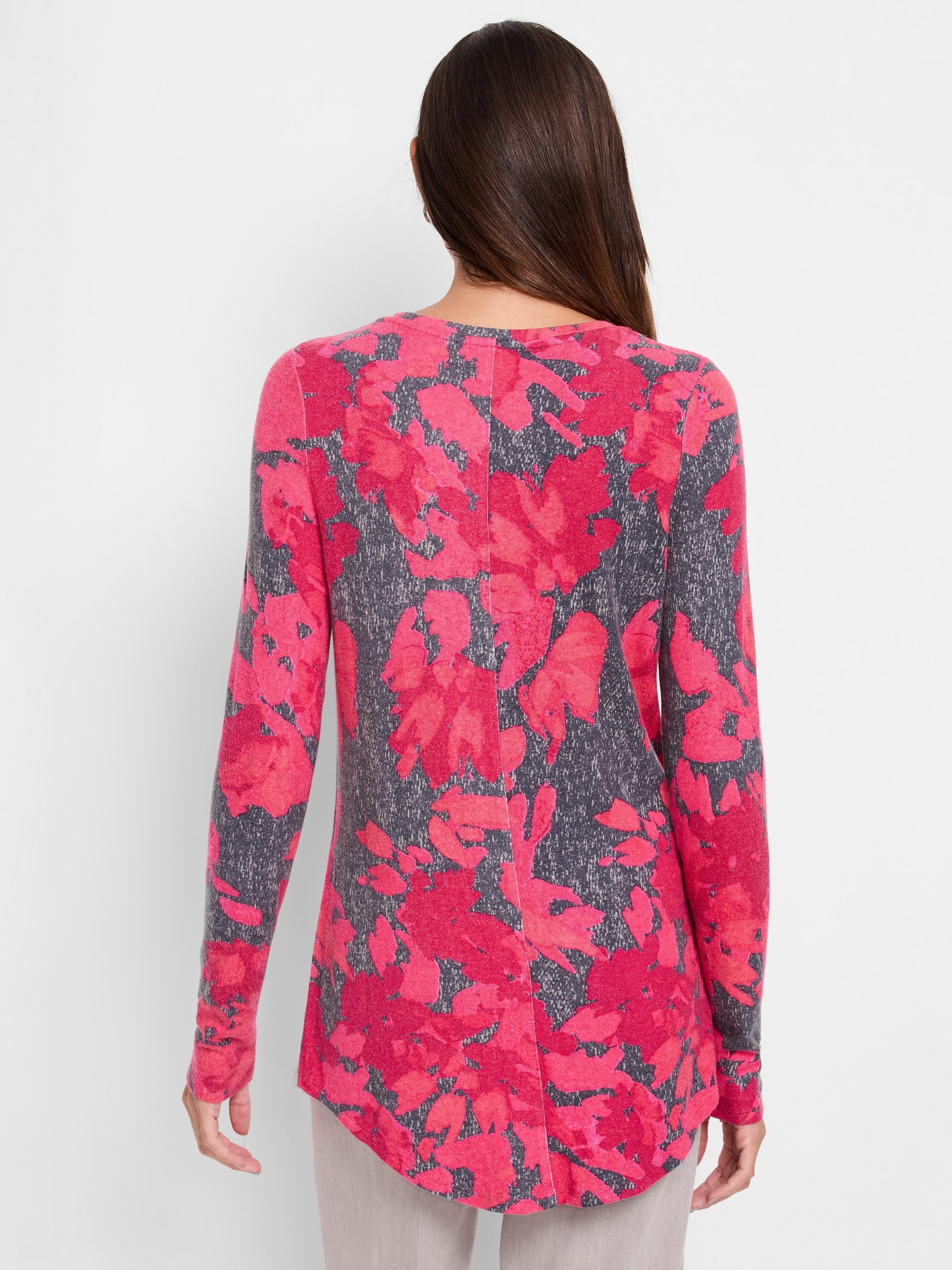 Long-sleeve shirt with pink and gray floral print.  Curved shirttail hem.