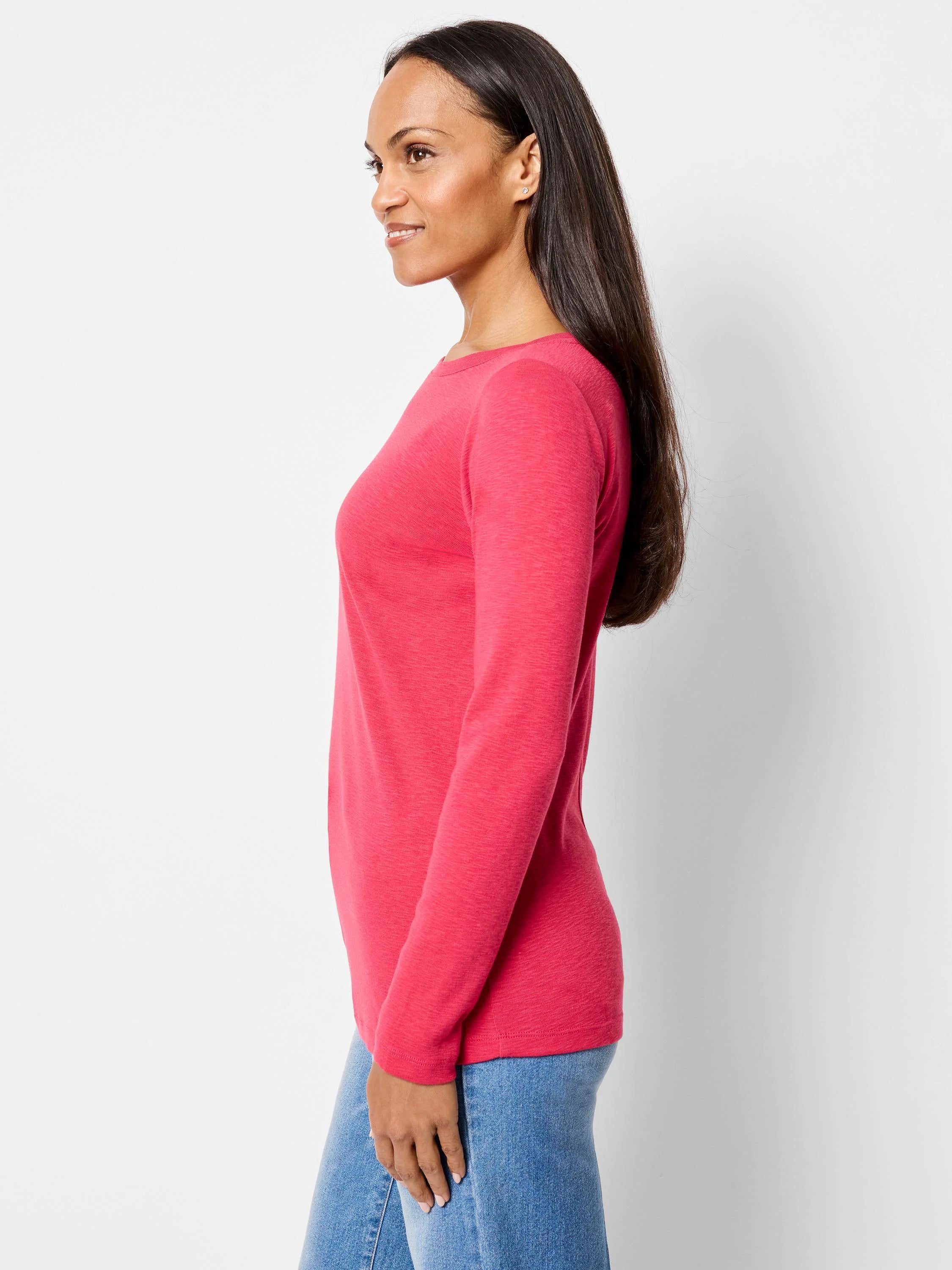 Pink, long-sleeve boatneck shirt. Side profile shows relaxed fit.