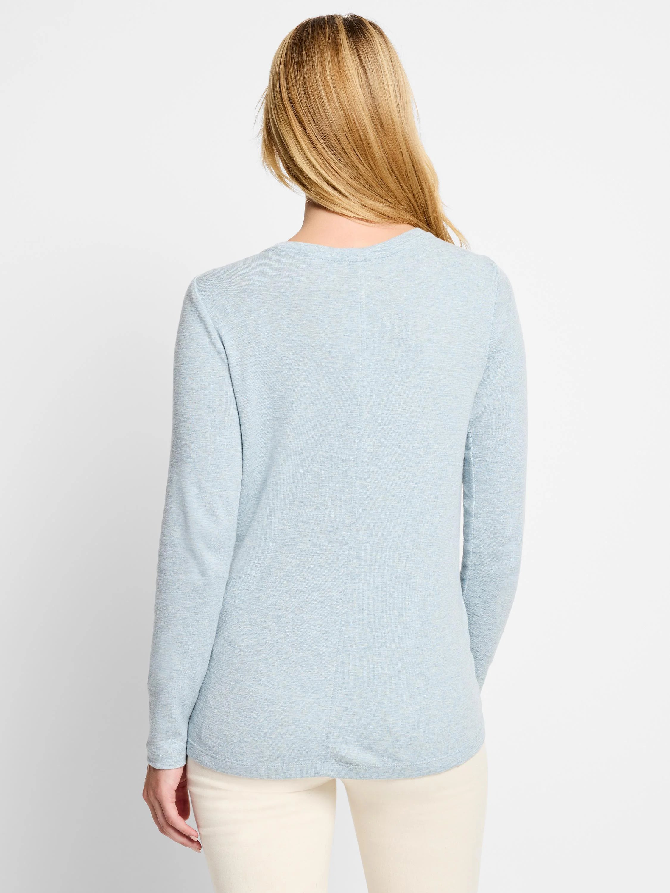 Light blue, long-sleeved boatneck shirt; back view.