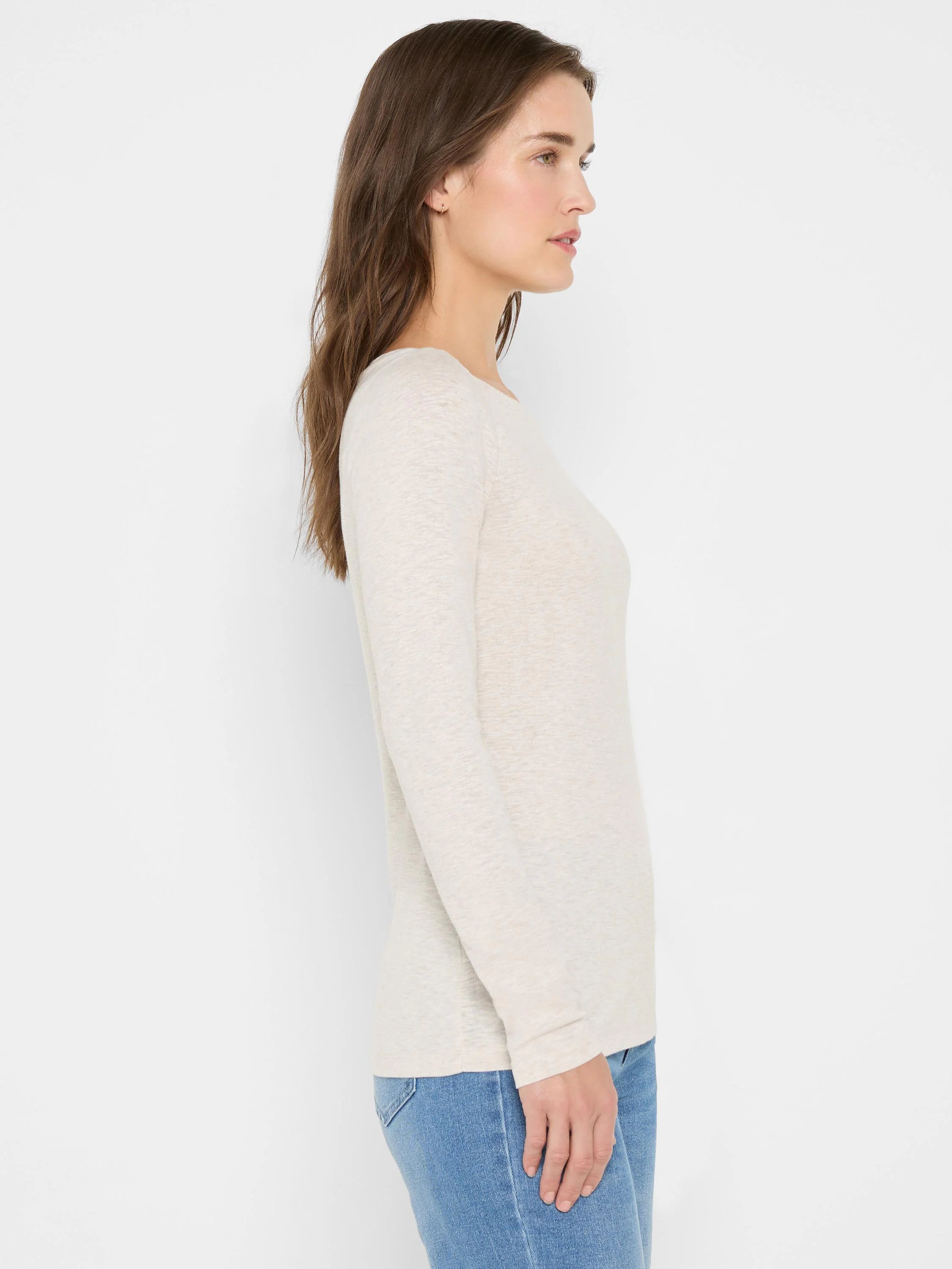 Off-white long-sleeve boatneck shirt. The fabric has a subtle texture.