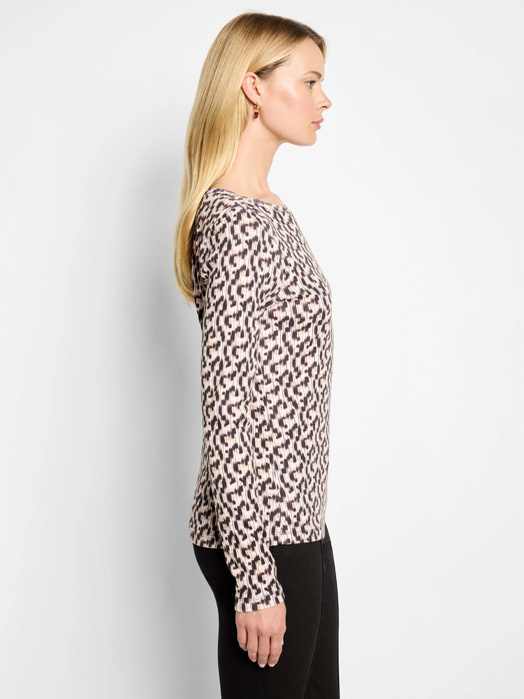 Cream and dark brown long sleeve boat neck tee with an abstract vertical stripe print.
