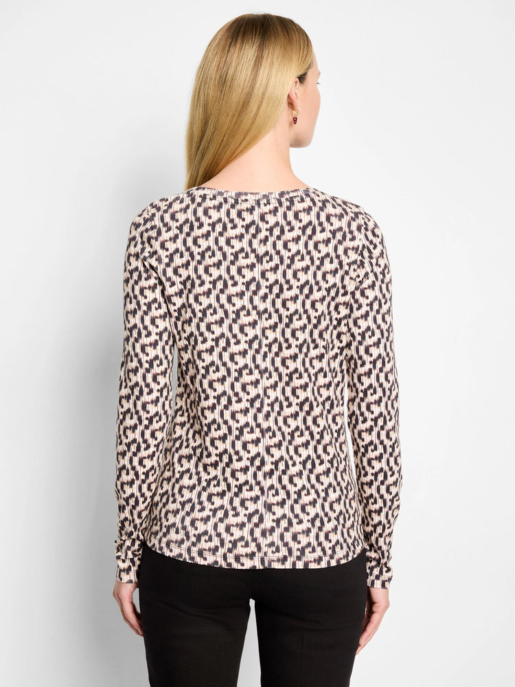 Long sleeve tee, back view. Light beige with dark brown abstract vertical print.