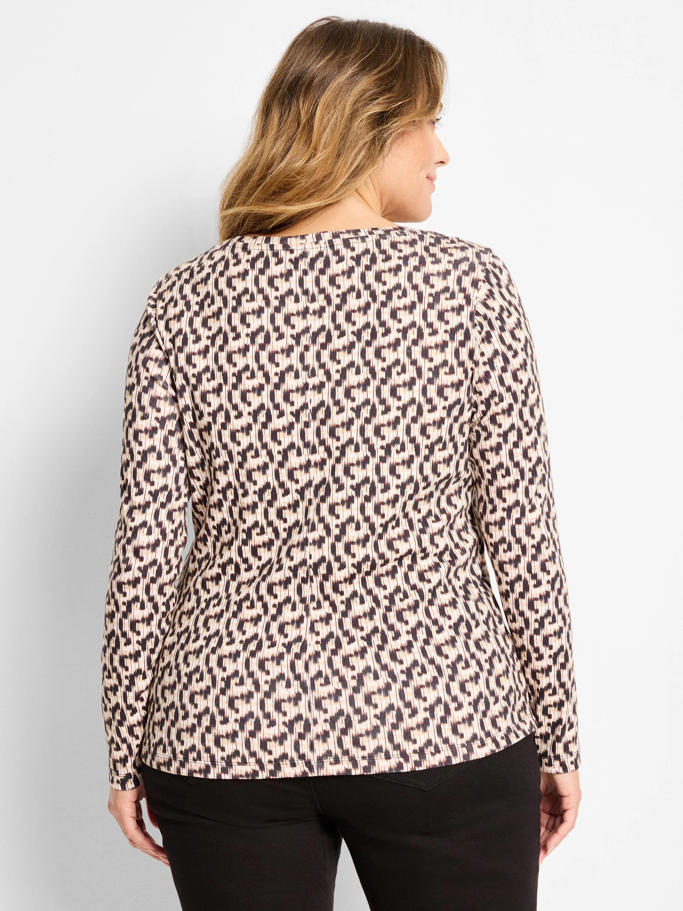 Long sleeve boat neck tee, back view, with an abstract dark brown & tan irregular pattern.