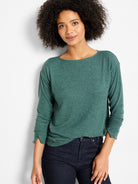 Heather green long-sleeve top with a boat neck and slit cuffs.