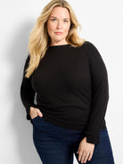 Black long sleeve boat neck top, relaxed fit.