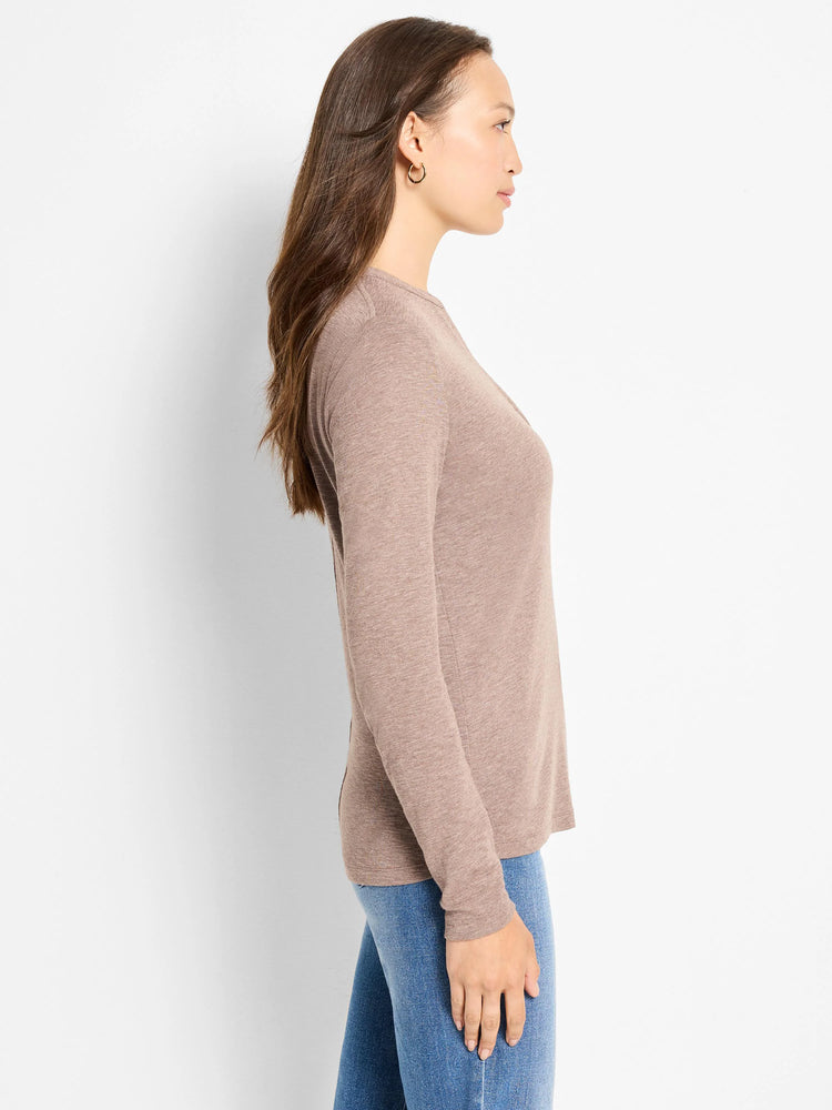 Here's alt text under 125 characters:
Mauve long-sleeve henley shirt; side profile. The shirt is a textured knit.