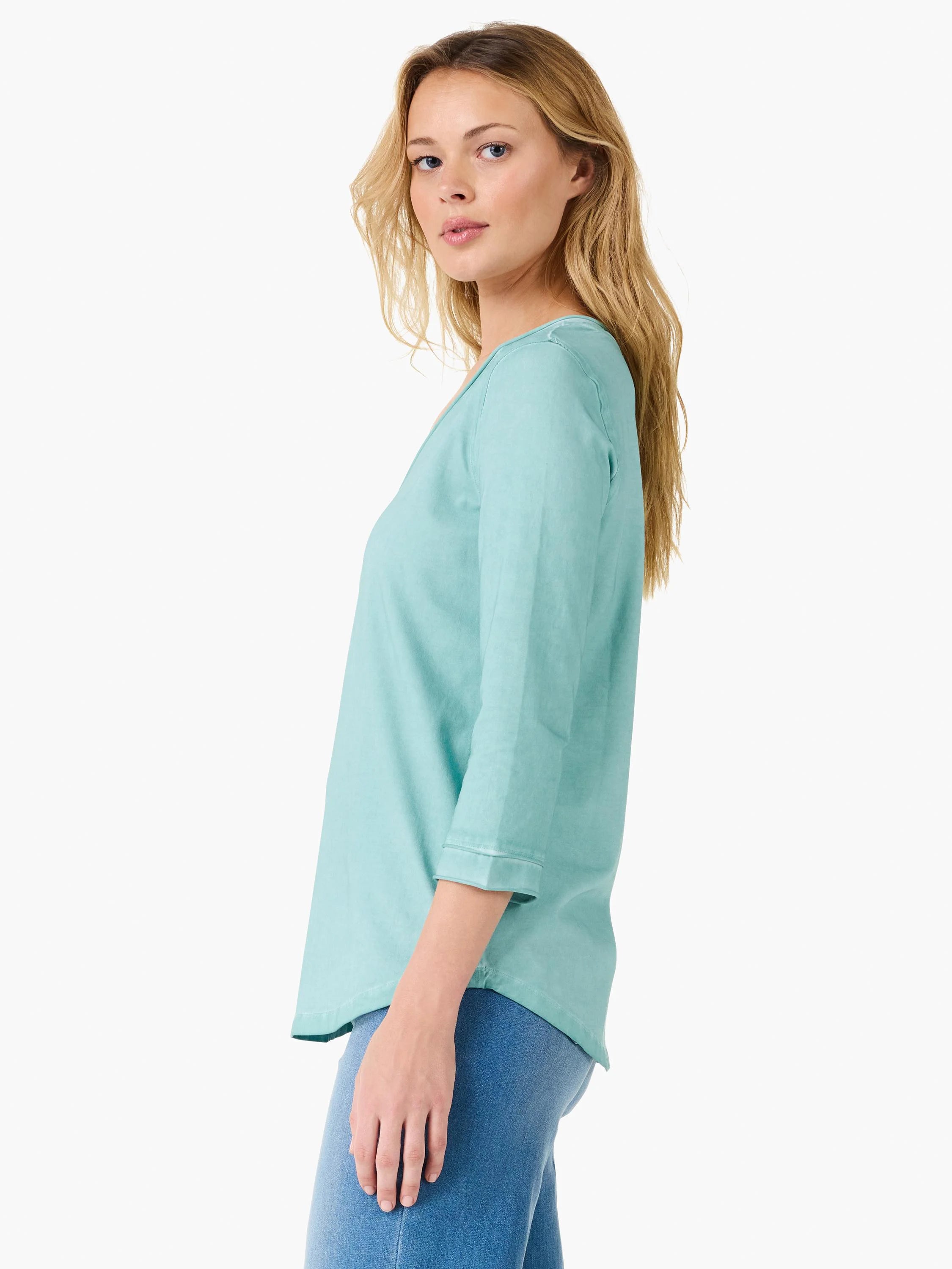 Light teal 3/4 sleeve V-neck tee with roll cuffs and a washed fabric texture.