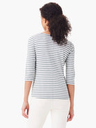 Gray and white horizontal striped 3/4 sleeve boat neck shirt; shown from the back.