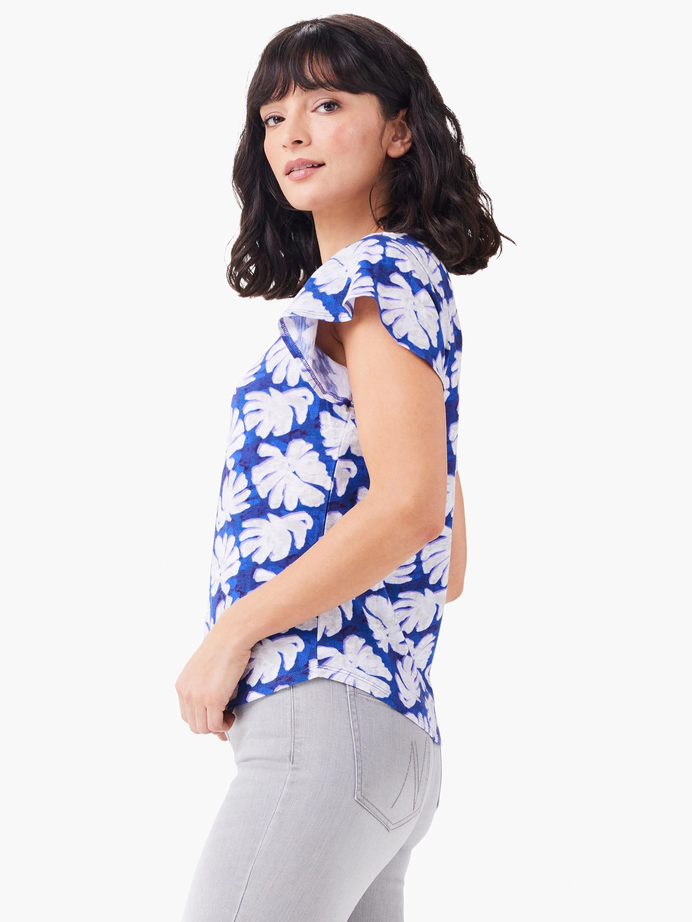 Here's alt text under 125 characters:
Short-sleeve, blue tee with white leaf print. Flutter sleeves.