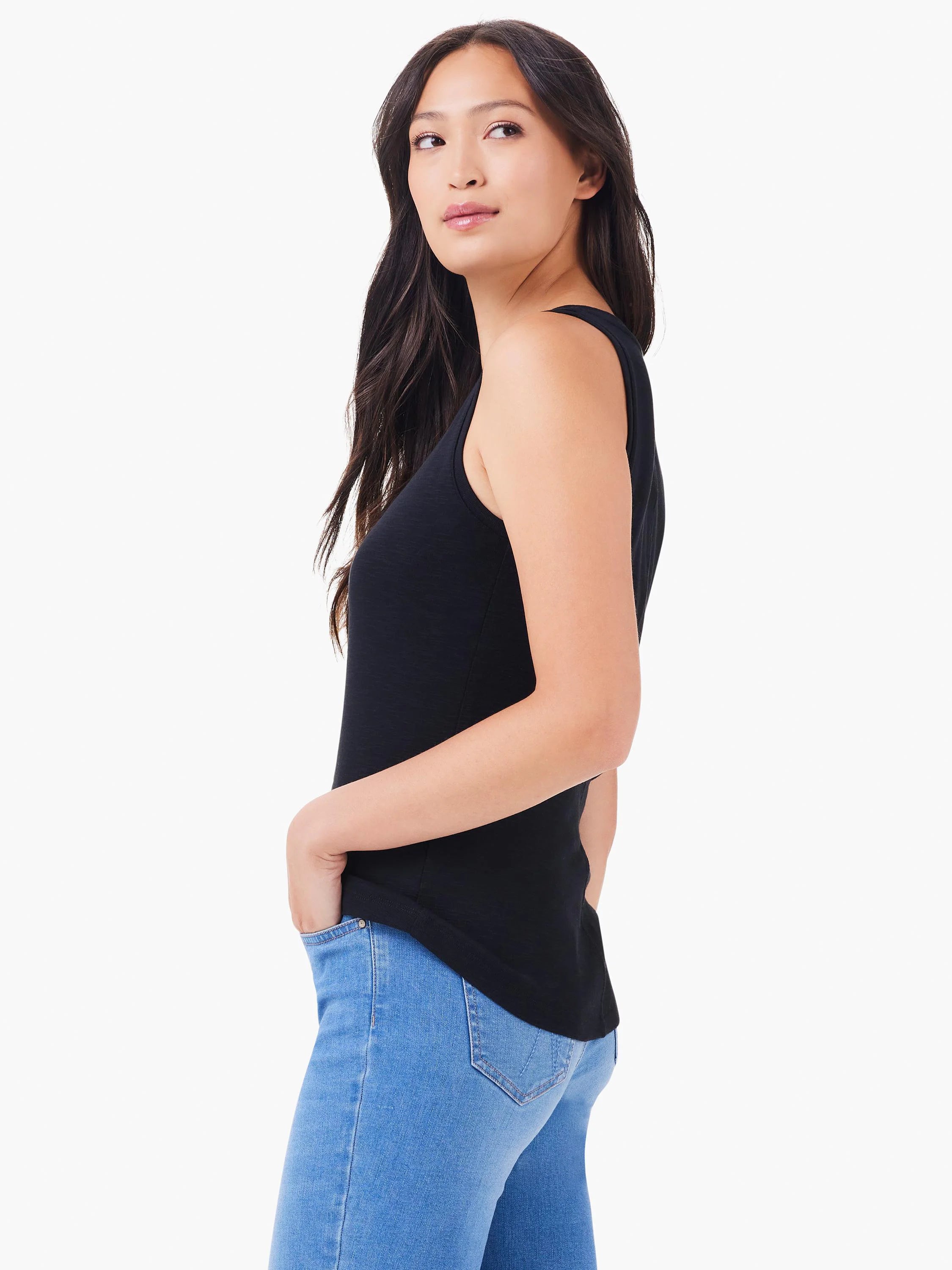Black boatneck tank top; sleeveless, fitted. Model shown wearing light blue jeans.