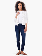 White denim-look jacket with contrast stitching, metal buttons, and a frayed hem.