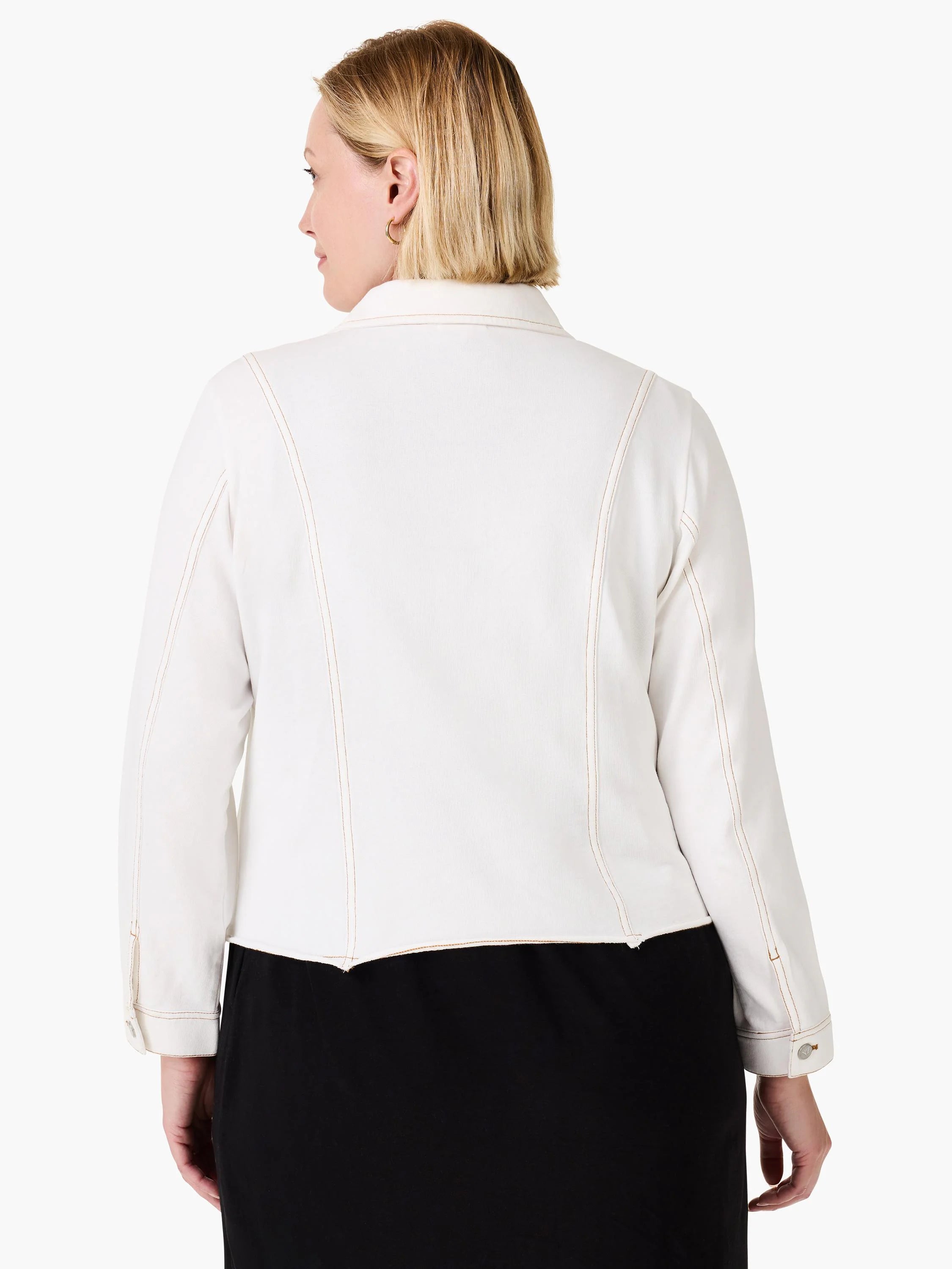 Cream jacket, back view, with tan contrast stitching, paneling, collar, raw hem, and buttoned cuffs.