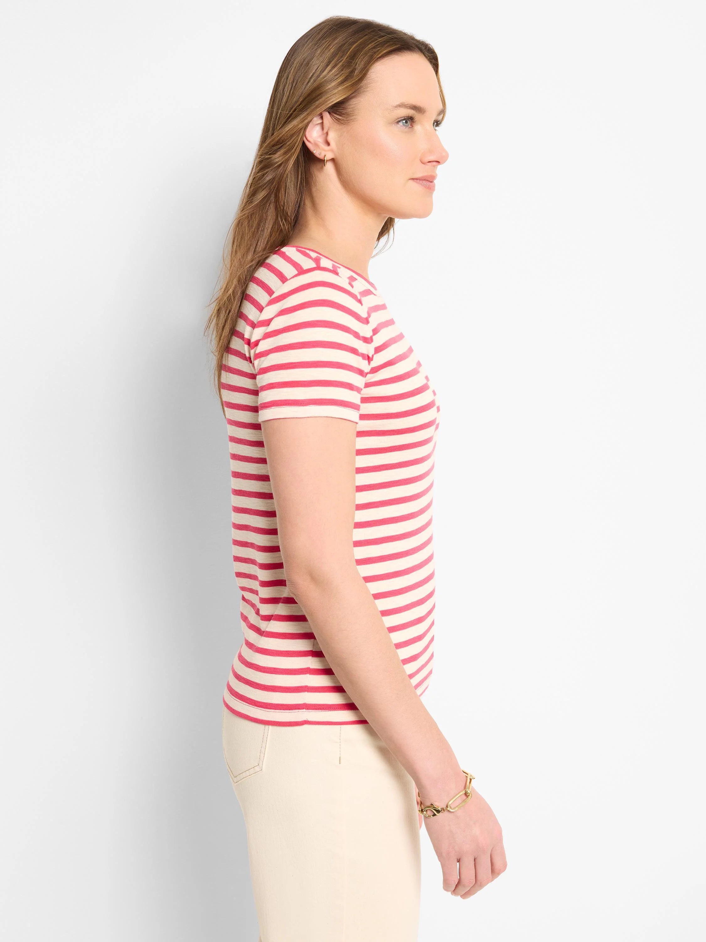 Cream-colored short-sleeve shirt with horizontal pink stripes; crew neck.