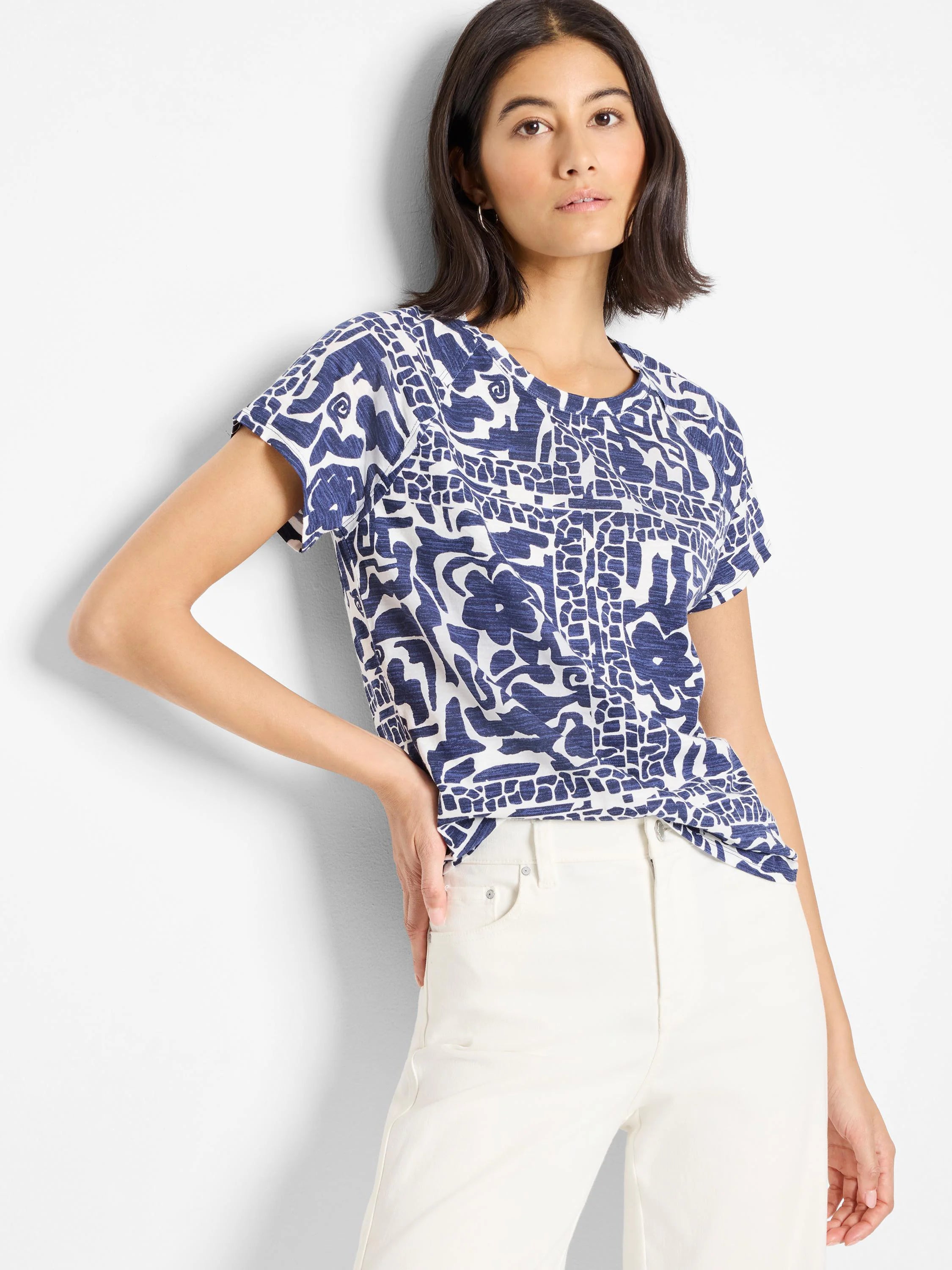 Crew neck, short-sleeve tee. Navy blue and white abstract print on a white background.