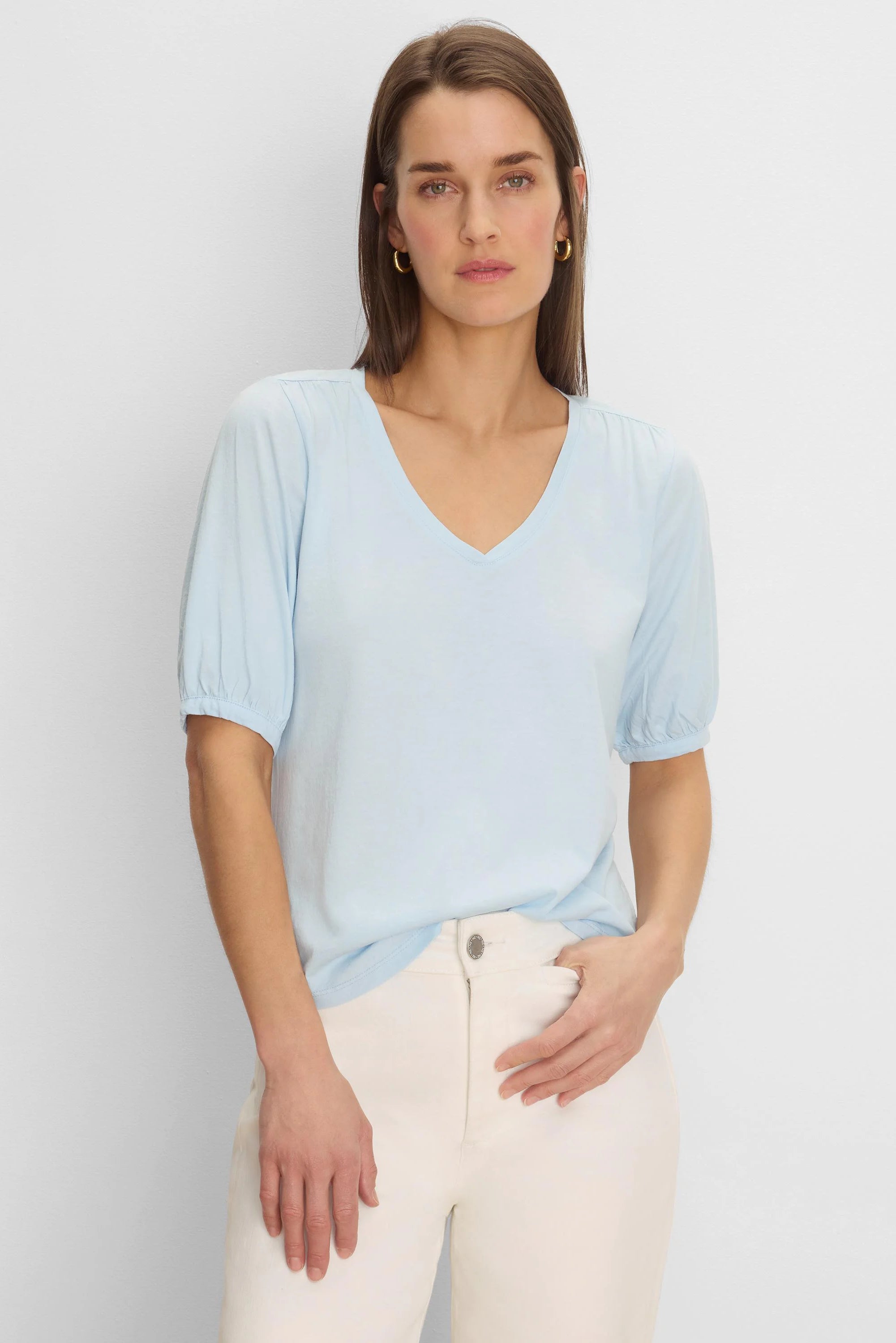 Light blue V-neck tee with elbow-length sleeves and gathered cuffs.