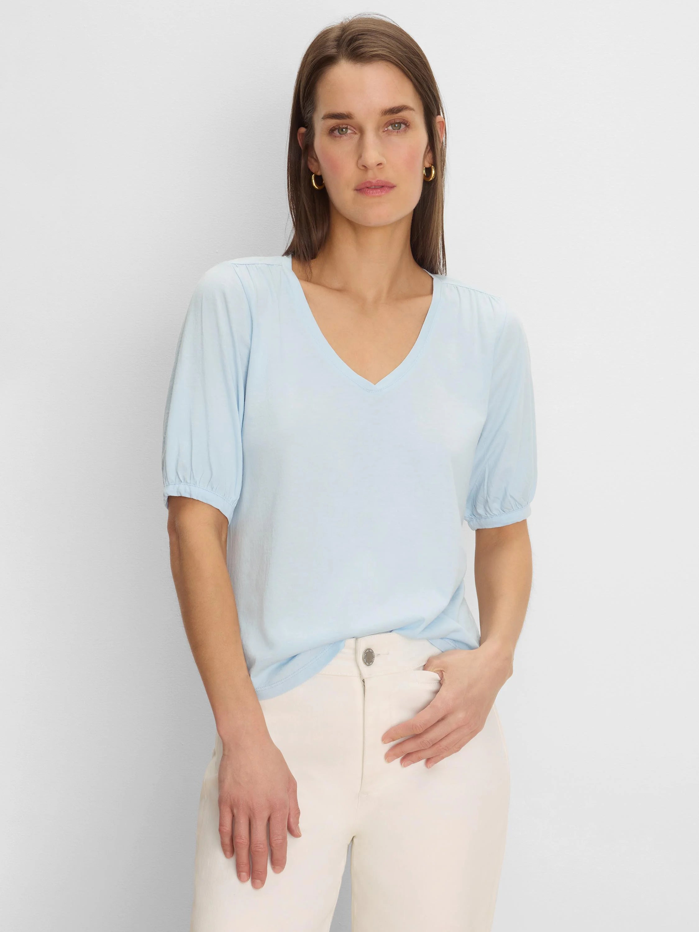 Light blue V-neck tee with elbow-length sleeves and gathered cuffs.