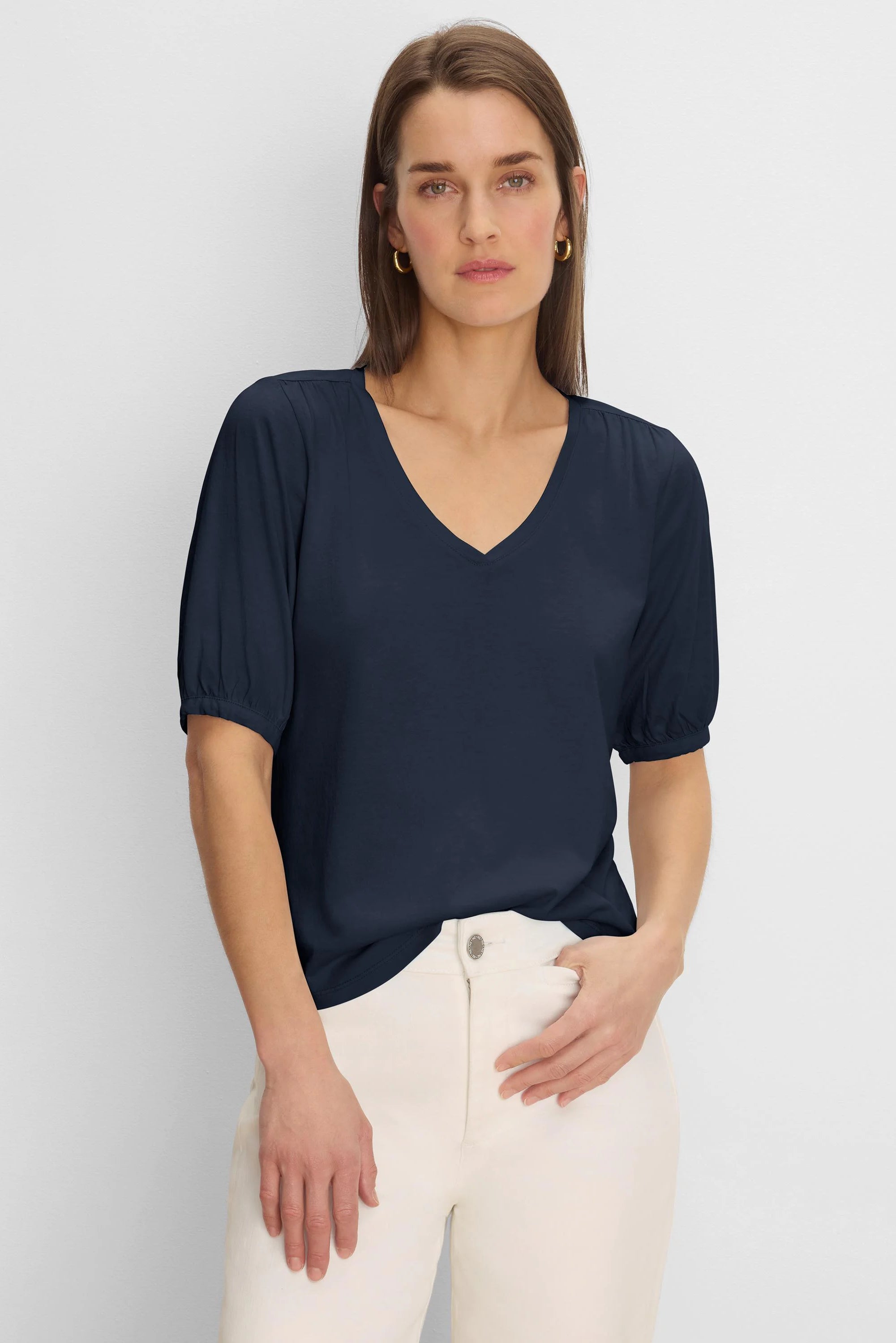 Navy V-neck tee with elbow-length sleeves, gathered at the shoulders.