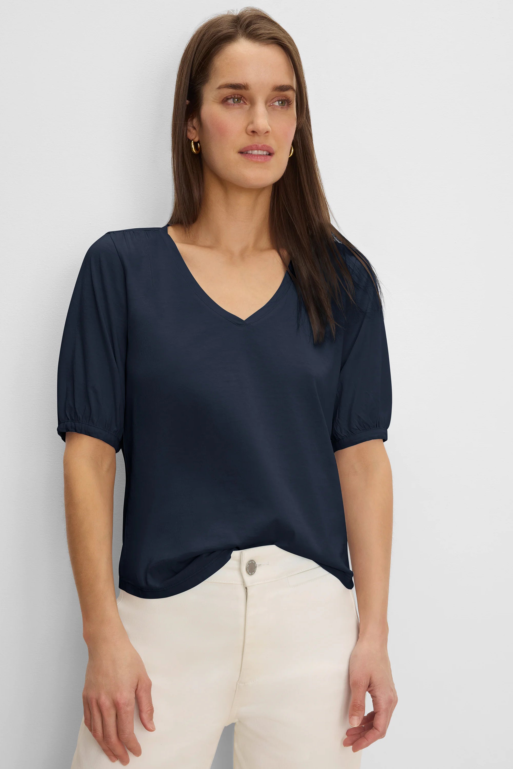 Navy V-neck elbow-sleeve tee with elasticated cuffs, shown on a model.